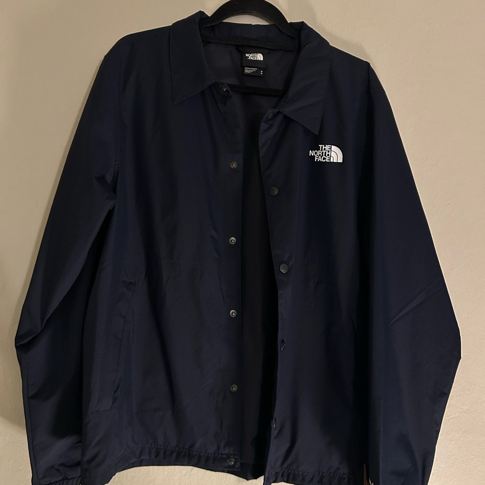 The North Face International Coaches Men’s Windwall Dark Blue Jacket